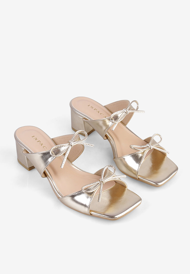 Reeve Heels in Gold