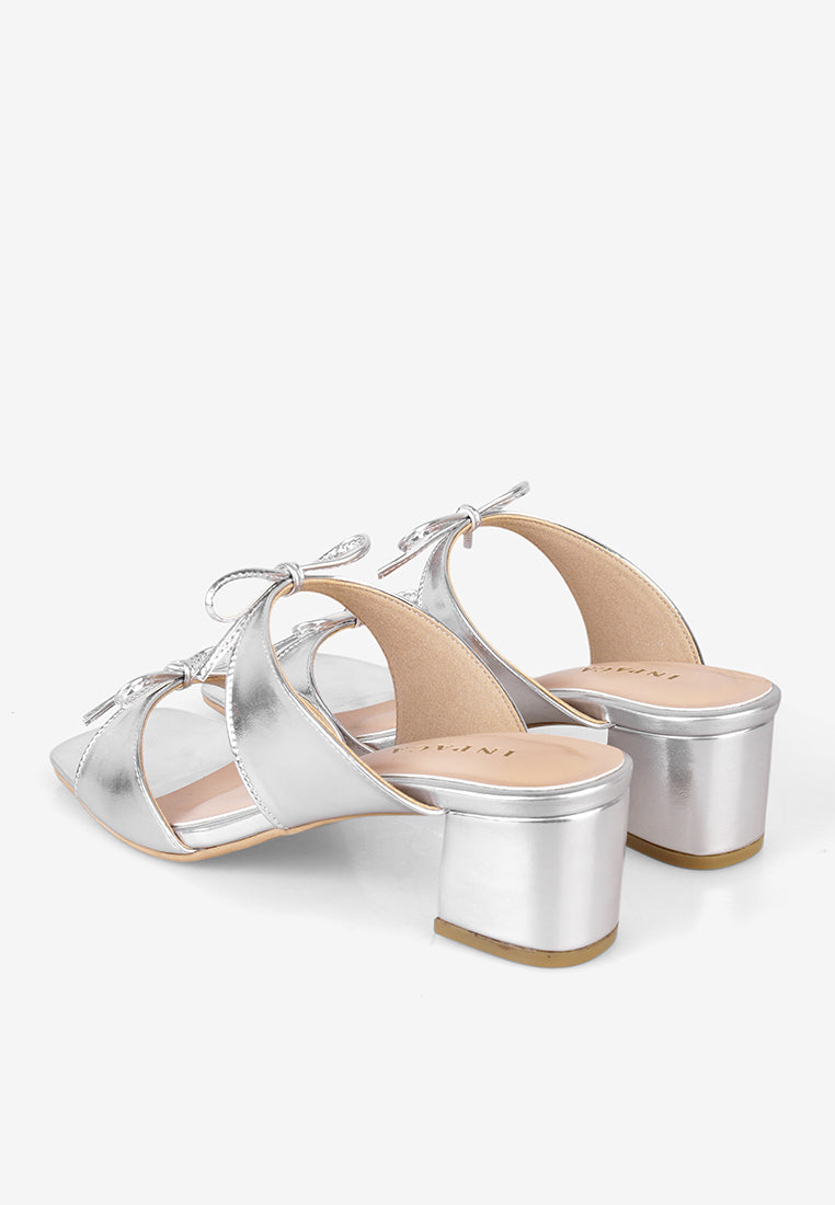 Reeve Heels in Silver